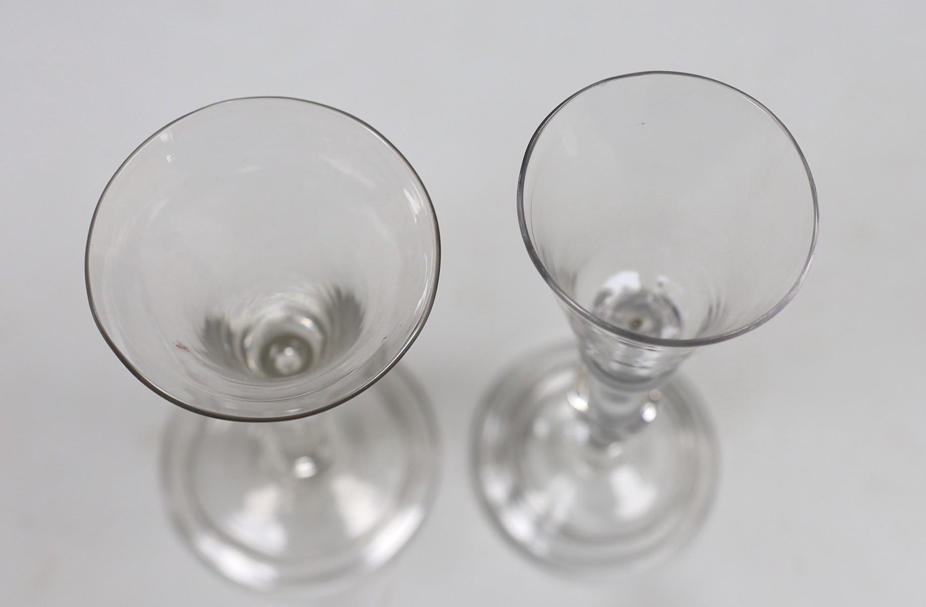 A George II double knopped stem wine glass and a similar ale flute, 16cm